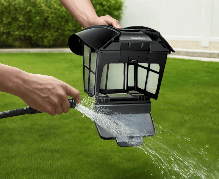 User effortlessly rinsing the iGarden Pool Cleaner K Series filter basket with a garden hose